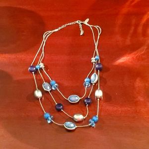 Silver-toned tiered necklace with blue beads